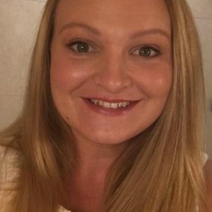 Molly B Foundation representative smiling for About Us page.