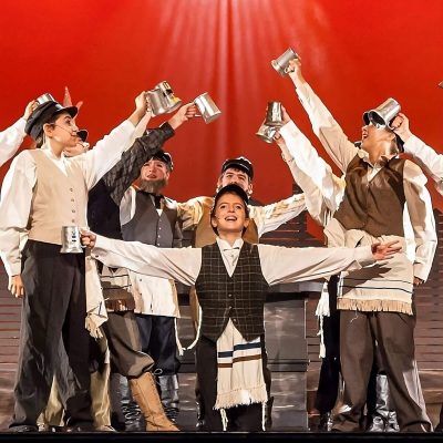 Molly and cast on stage of Fiddler on the roof