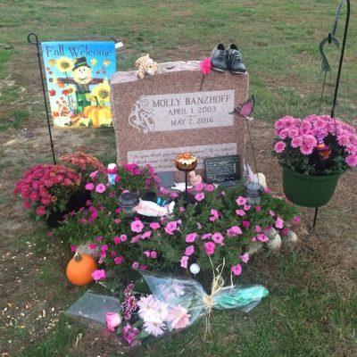 Molly's headstone with flowers